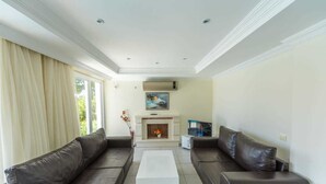 Villa, 3 chambres | Aire de séjour