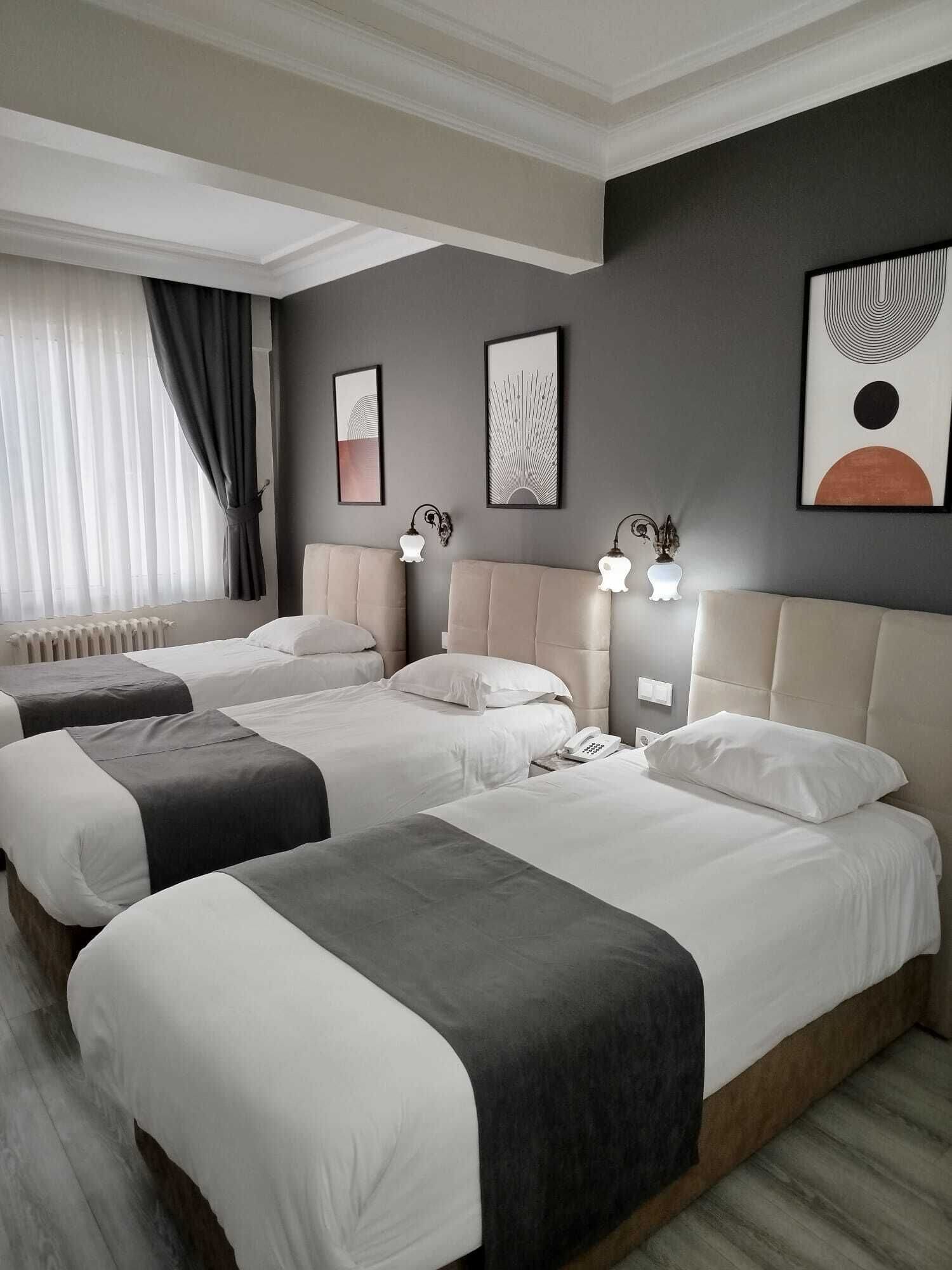 Tripla Standard, 3 letti singoli | Una scrivania, Wi-Fi gratuito, lenzuola