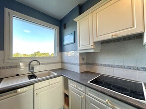 Microwave, stovetop, dishwasher, coffee/tea maker