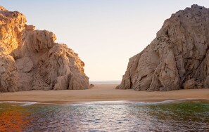 On the beach, sun loungers, beach towels