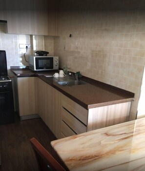 Room, Sea View | Private kitchen | Full-sized fridge, microwave, oven, stovetop - Height Twisters Apartments (Nairobi)
