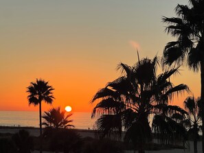 On the beach, sun-loungers, beach towels