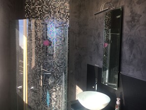 Bathtub, hair dryer, towels, soap