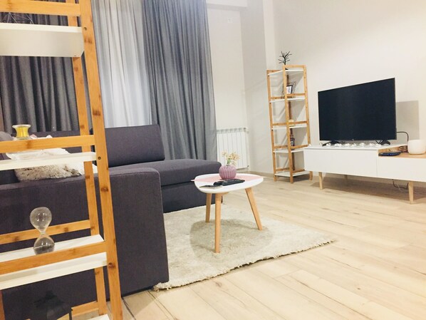 Apartment (M2) | Living area | Flat-screen TV - Sol's M2 White Modern Apartments (Tbilisi)