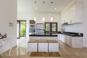 Fridge, stovetop, cookware/dishes/utensils, spices