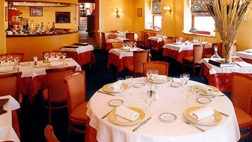 2 restaurants, breakfast, lunch, dinner served; local cuisine