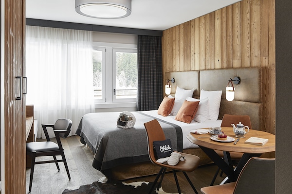 Ropa de cama de alta calidad y minibar