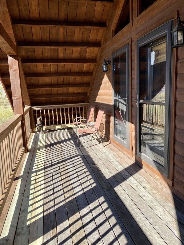 Terrace/patio - Spacious cabin off Hwy 85 with beautiful views and plenty of trailer parking. (Lead)