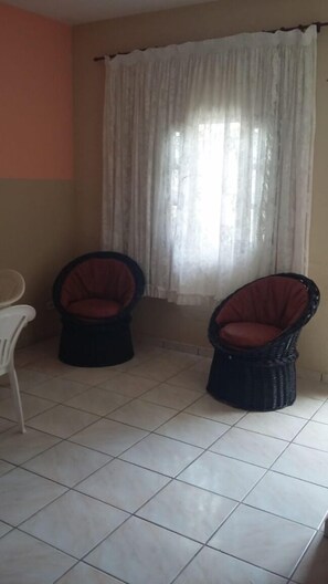 Kitnet | Área de estar | TV de tela plana