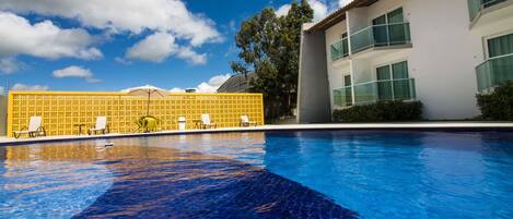 Outdoor pool, pool umbrellas, sun loungers