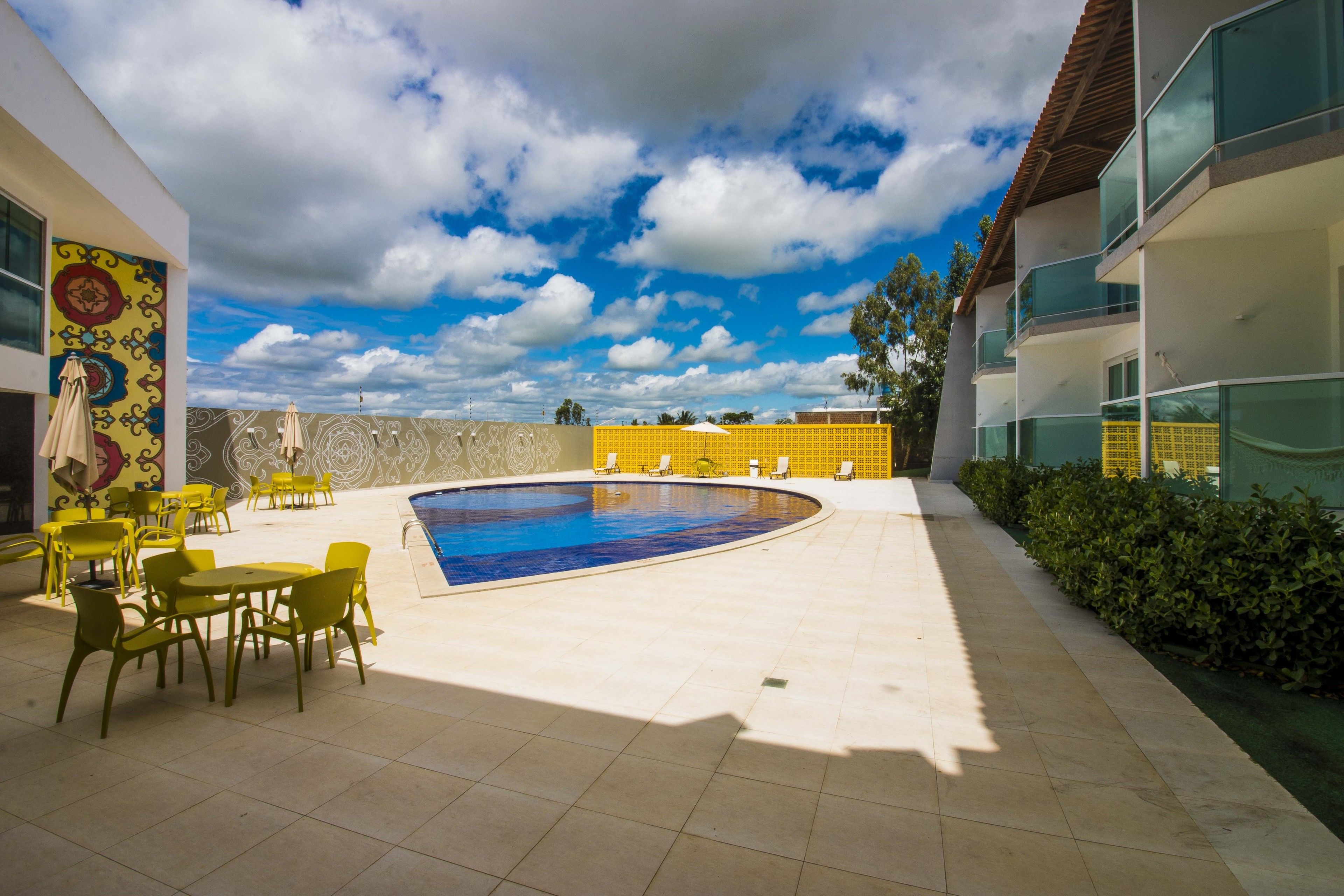 outdoor pool, pool umbrellas, pool loungers