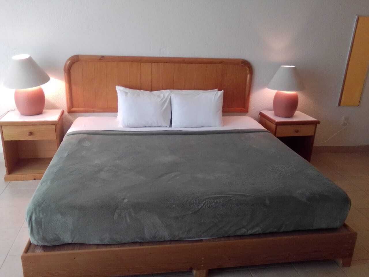 Down comforters, laptop workspace, iron/ironing board, bed sheets