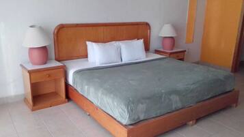 Down duvets, laptop workspace, iron/ironing board, bed sheets