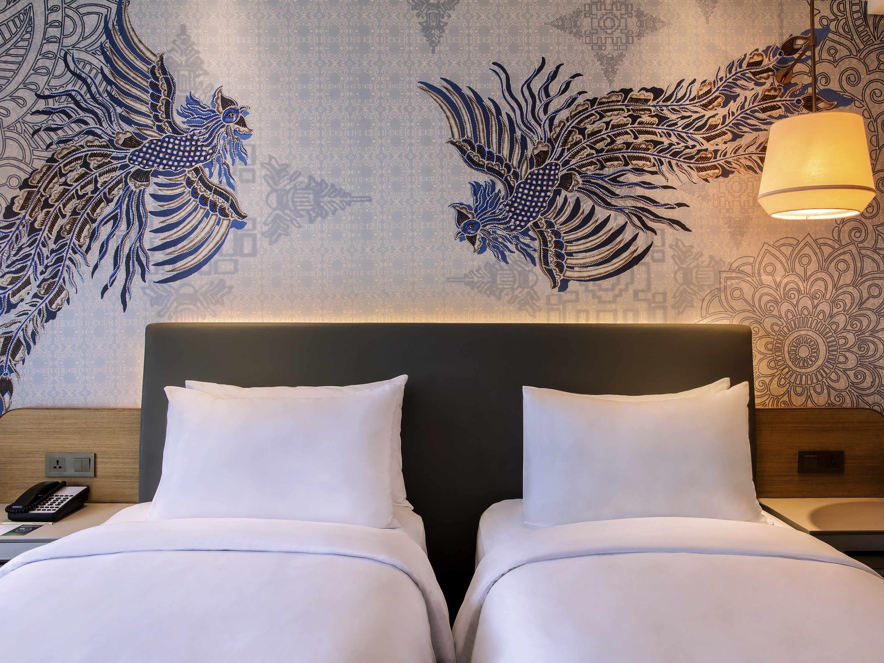 Select Comfort beds, minibar, in-room safe, desk