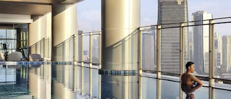 Indoor pool, open 6:00 AM to 7:30 PM, pool loungers