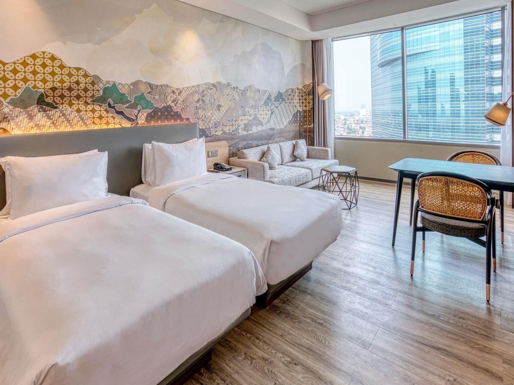 Select Comfort beds, minibar, in-room safe, desk