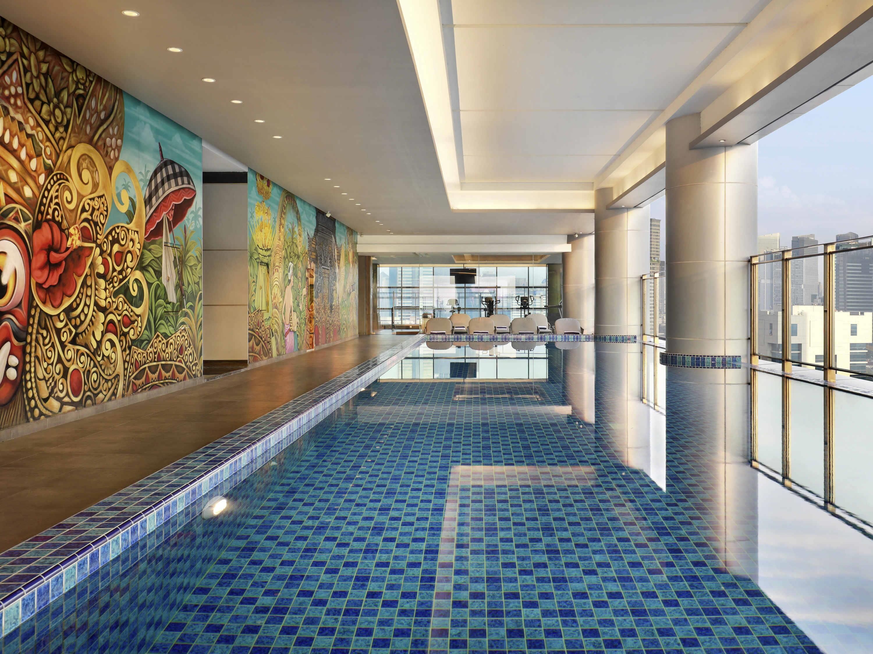 Indoor pool, open 6:00 AM to 7:30 PM, pool loungers