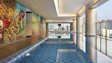 Indoor pool, open 6:00 AM to 7:30 PM, pool loungers