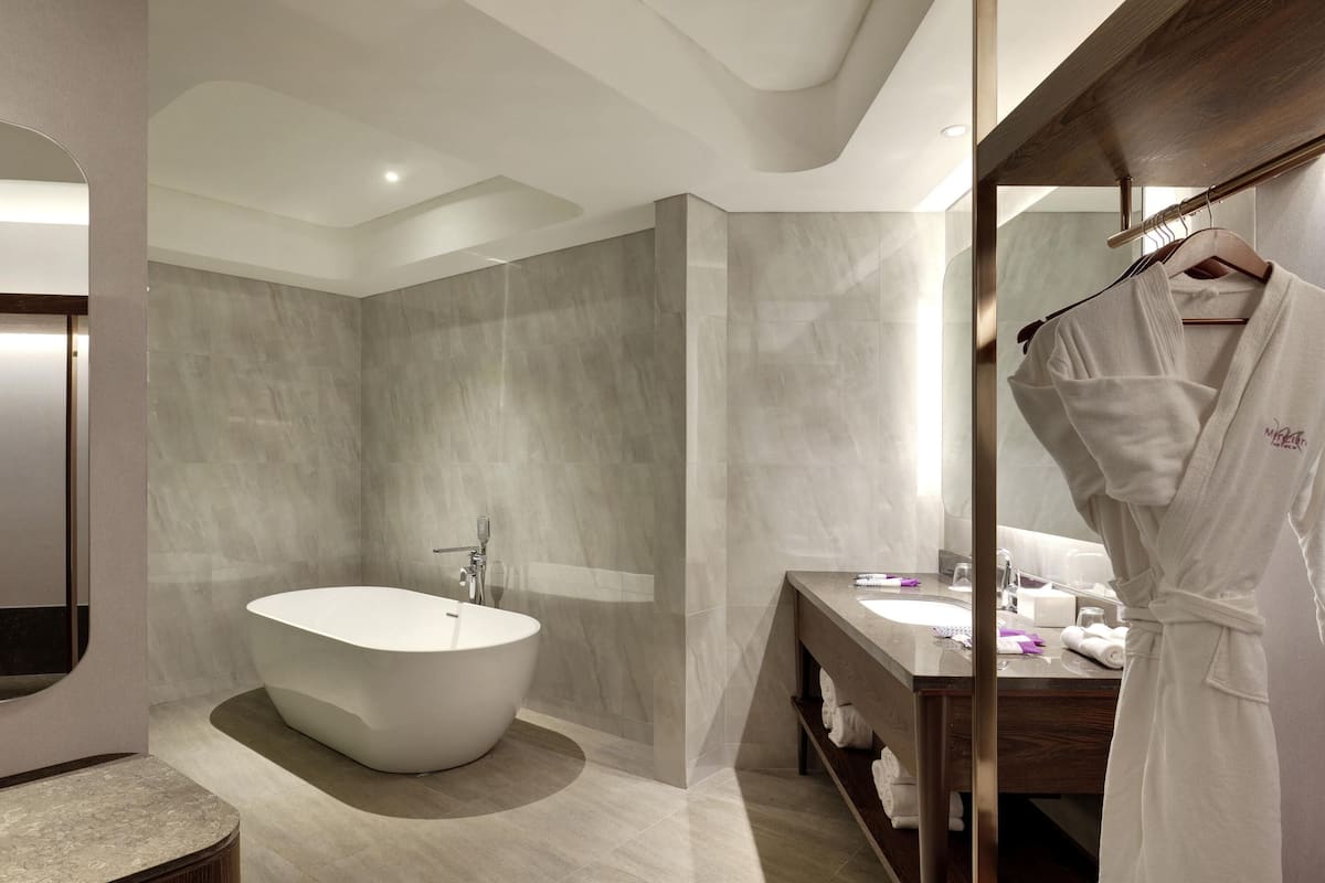 Suite familiar, 1 cama King size | 1 habitación, camas Select Comfort y minibar