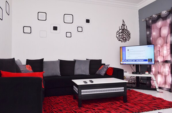Comfort Apartment, 2 Bedrooms | Living area | Flat-screen TV