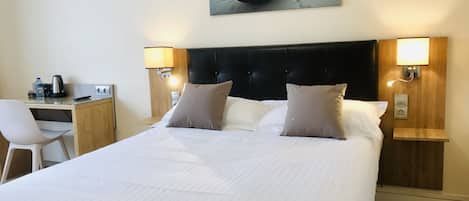 Premium bedding, in-room safe, individually decorated