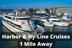 Enjoy scenic views of the marina and nearby boats, with Hy-Line Cruises just a short distance away.