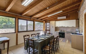 Fridge, stovetop, dishwasher, coffee/tea maker