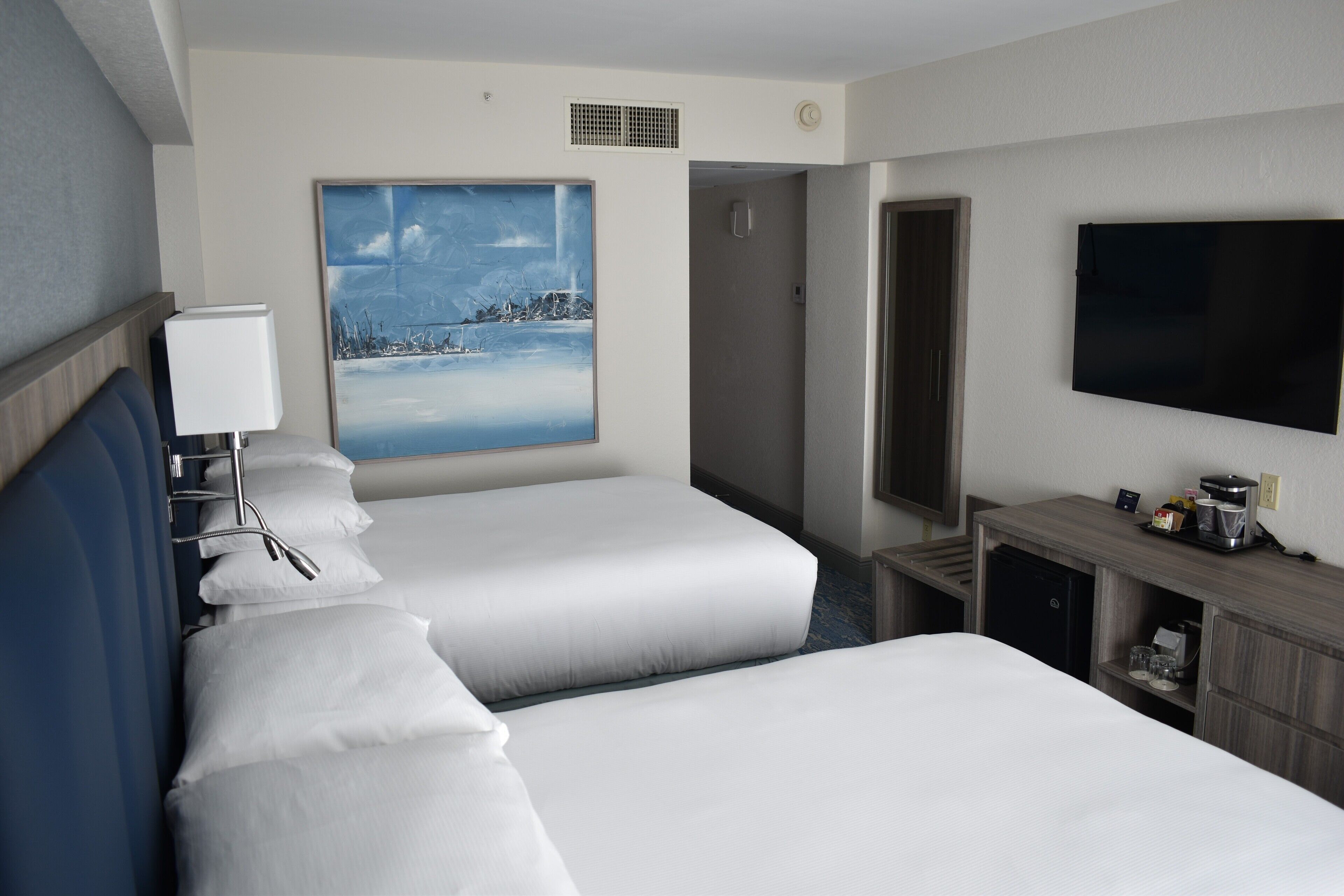 room, 2 double beds | in-room safe, desk, laptop workspace, blackout curtains