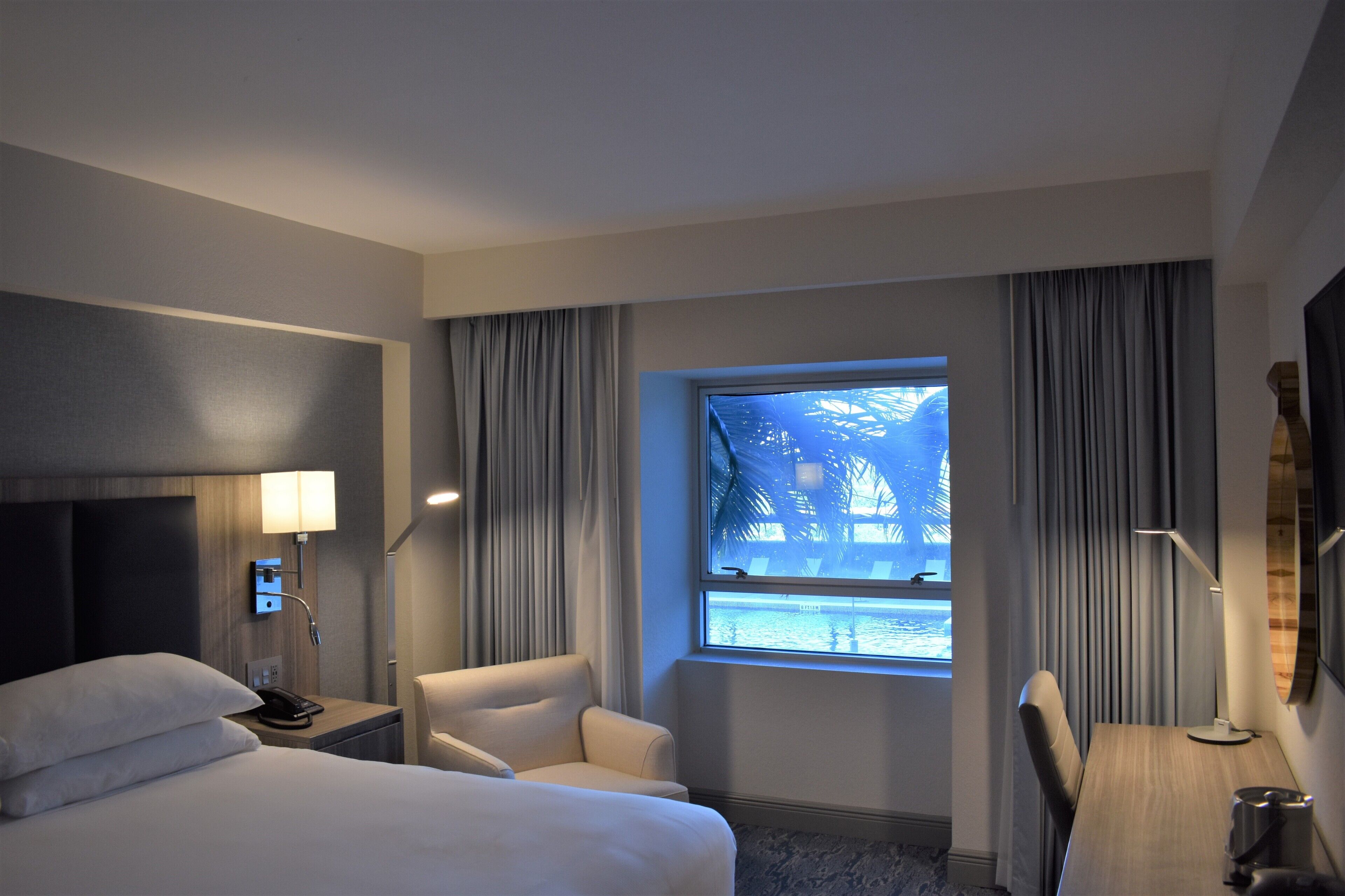 room, 1 king bed, pool view | view from room