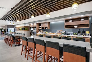 Free daily on-the-go breakfast - Home2 Suites by Hilton Bettendorf Quad Cities (Bettendorf)