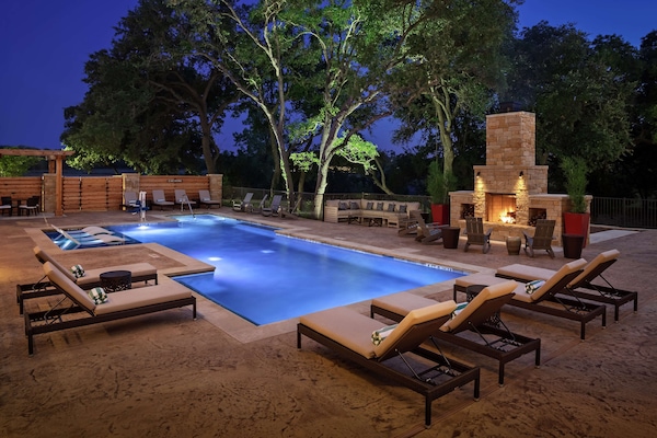 Outdoor pool, open 8:00 AM to 10:00 PM, sun loungers