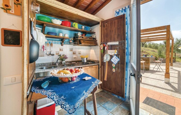Fridge, stovetop, dishwasher, coffee/tea maker