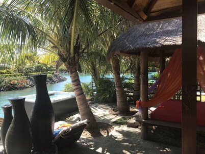 Spacious Balinese style house situated right at the water front