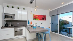 Apartment, 1 Bedroom | Private kitchen | Coffee/tea maker, full-sized fridge, microwave, oven - Brand New Apartment Quinta Avenida (Puerto Aventuras)