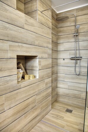 Shower, eco-friendly toiletries, hair dryer, towels