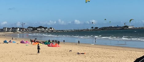 On the beach, sun-loungers