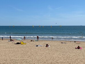On the beach, sun-loungers