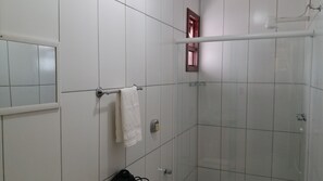 Shower, towels, toilet paper