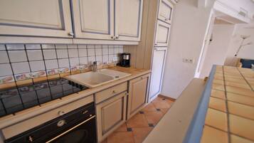 Réfrigérateur, four, lave-vaisselle, grille-pain