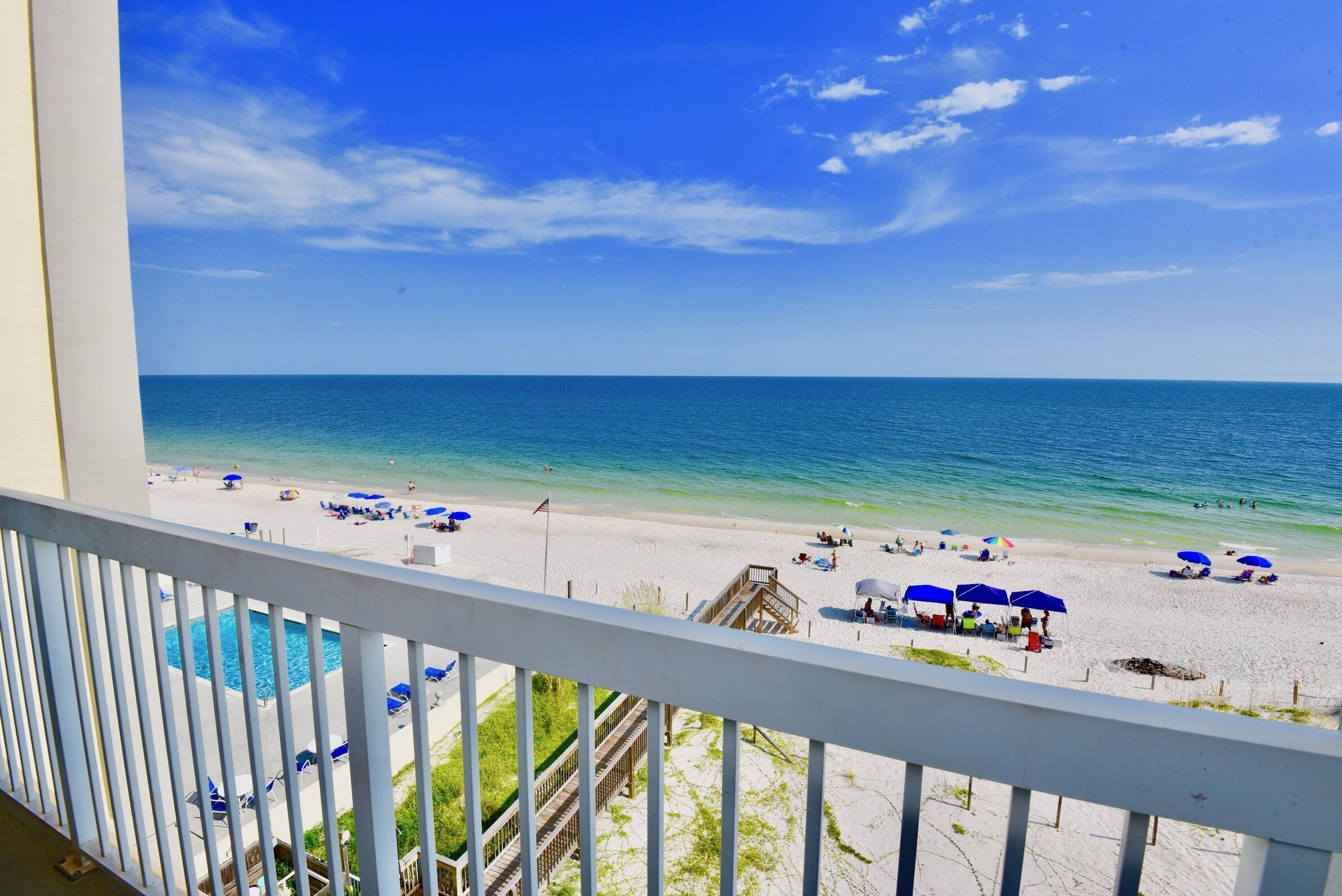 Dog friendly beachfront condo with in/out pools