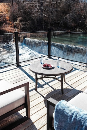Outdoor dining. Historic Waterfall Mill with Hot Tub