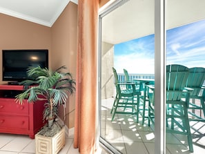 Enjoy a comfortable stay with a TV, potted plant, and dresser, plus access to an outdoor seating area.