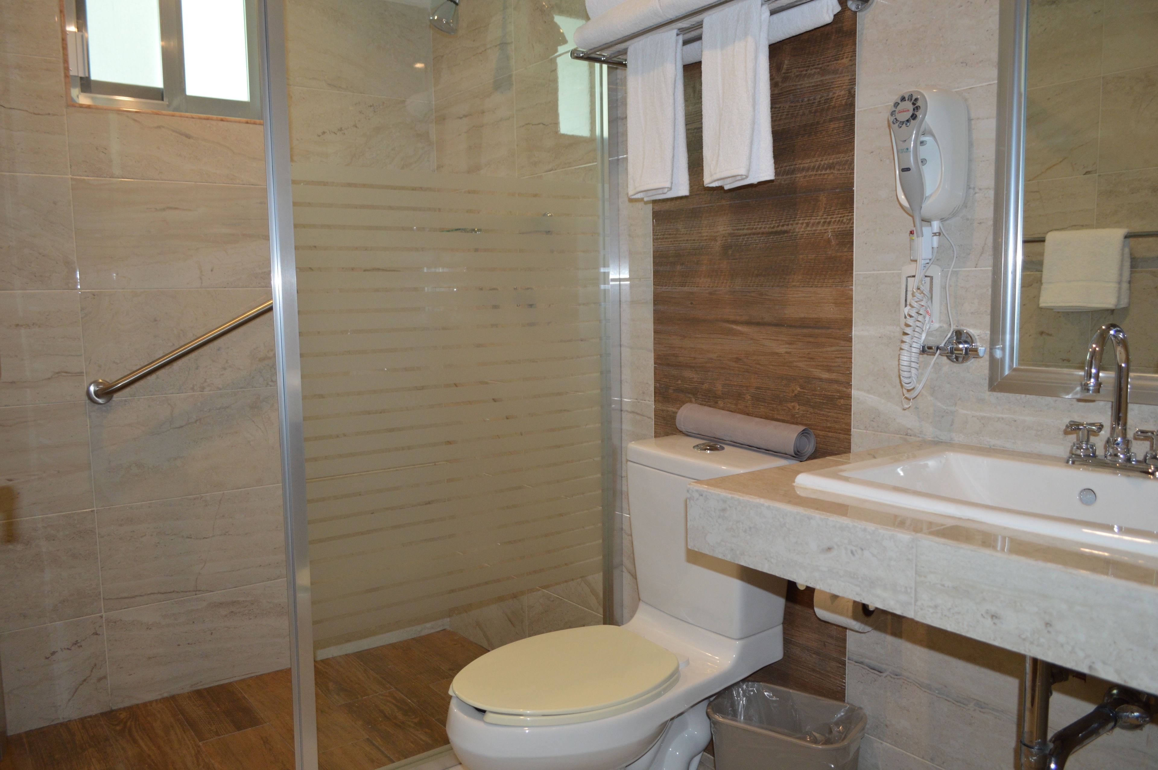 executive room, 1 king bed | bathroom | shower, rainfall showerhead, free toiletries, hair dryer