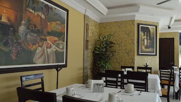 Breakfast, lunch, dinner served; local cuisine