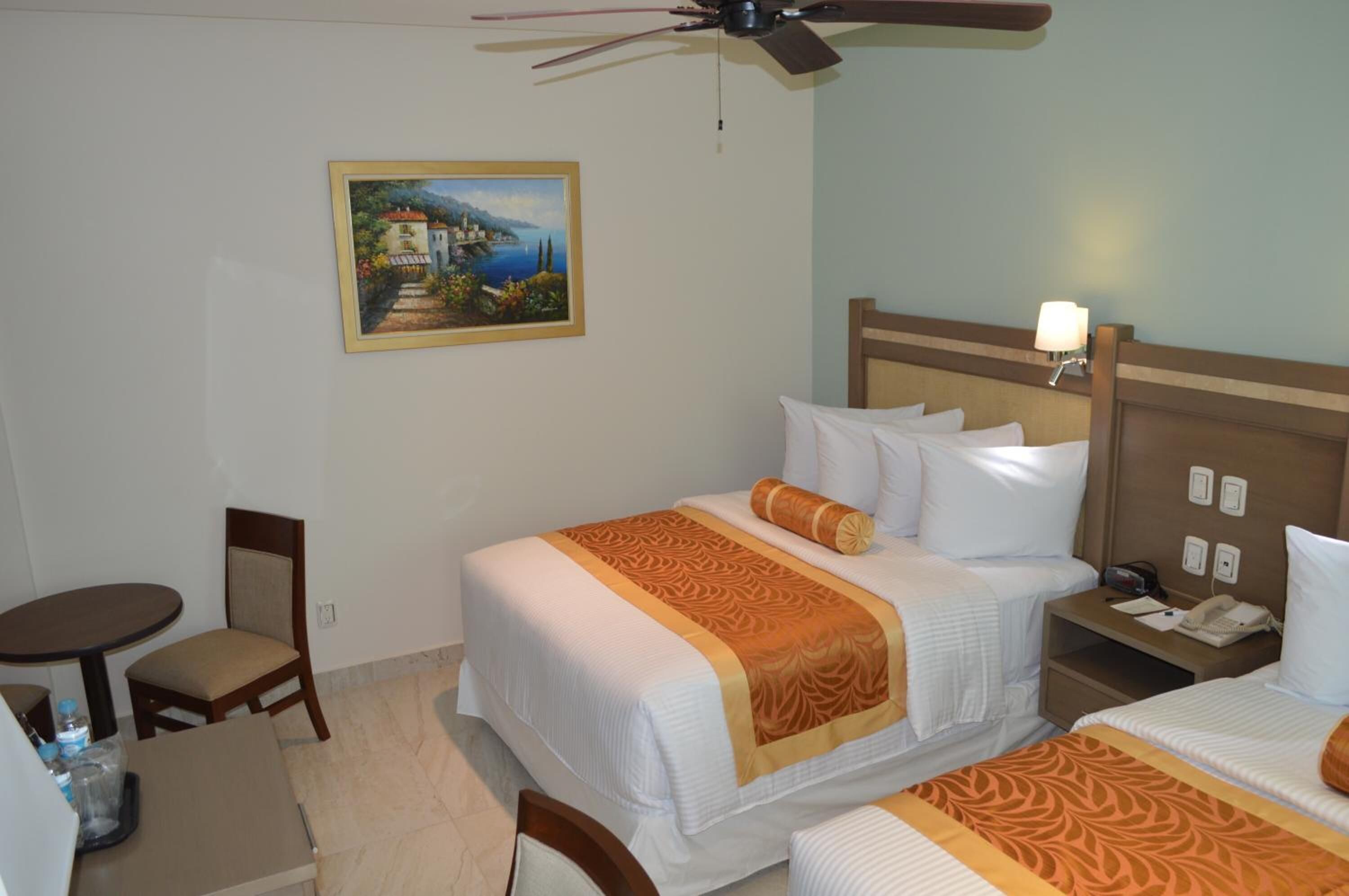 premium bedding, down duvets, pillow-top beds, in-room safe