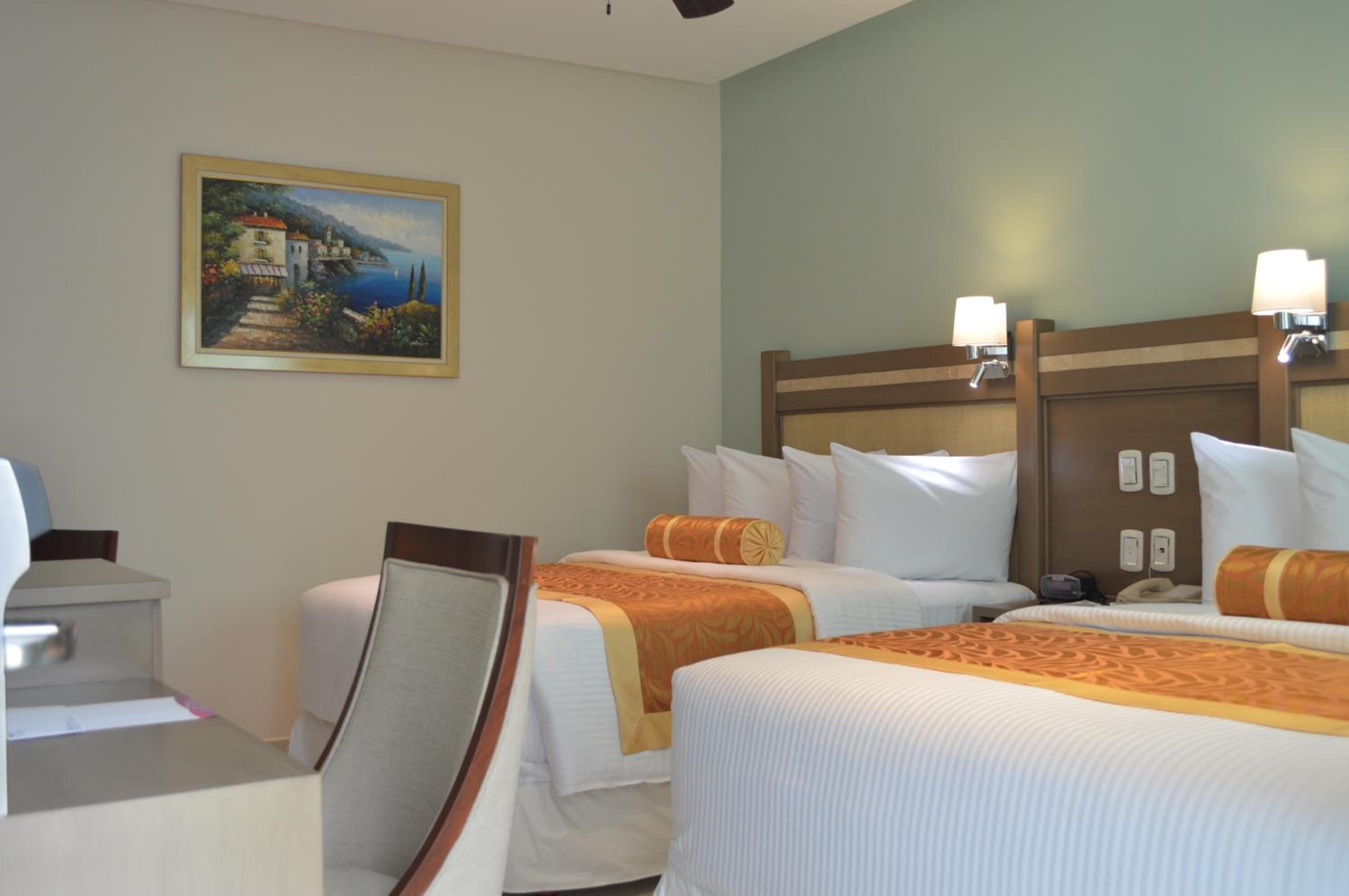 premium bedding, down duvets, pillow-top beds, in-room safe