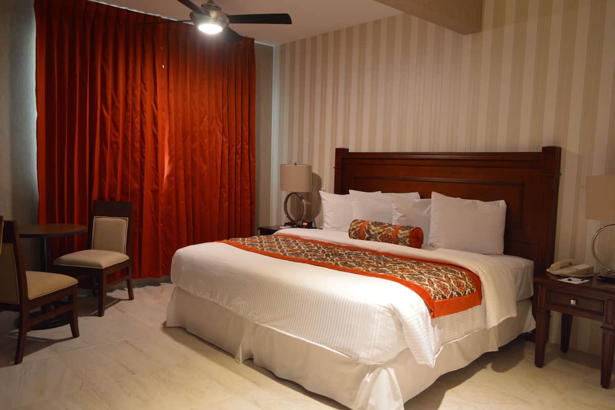 Junior Suite, 1 King Bed with Sofa bed | Premium bedding, down comforters, pillowtop beds, in-room safe