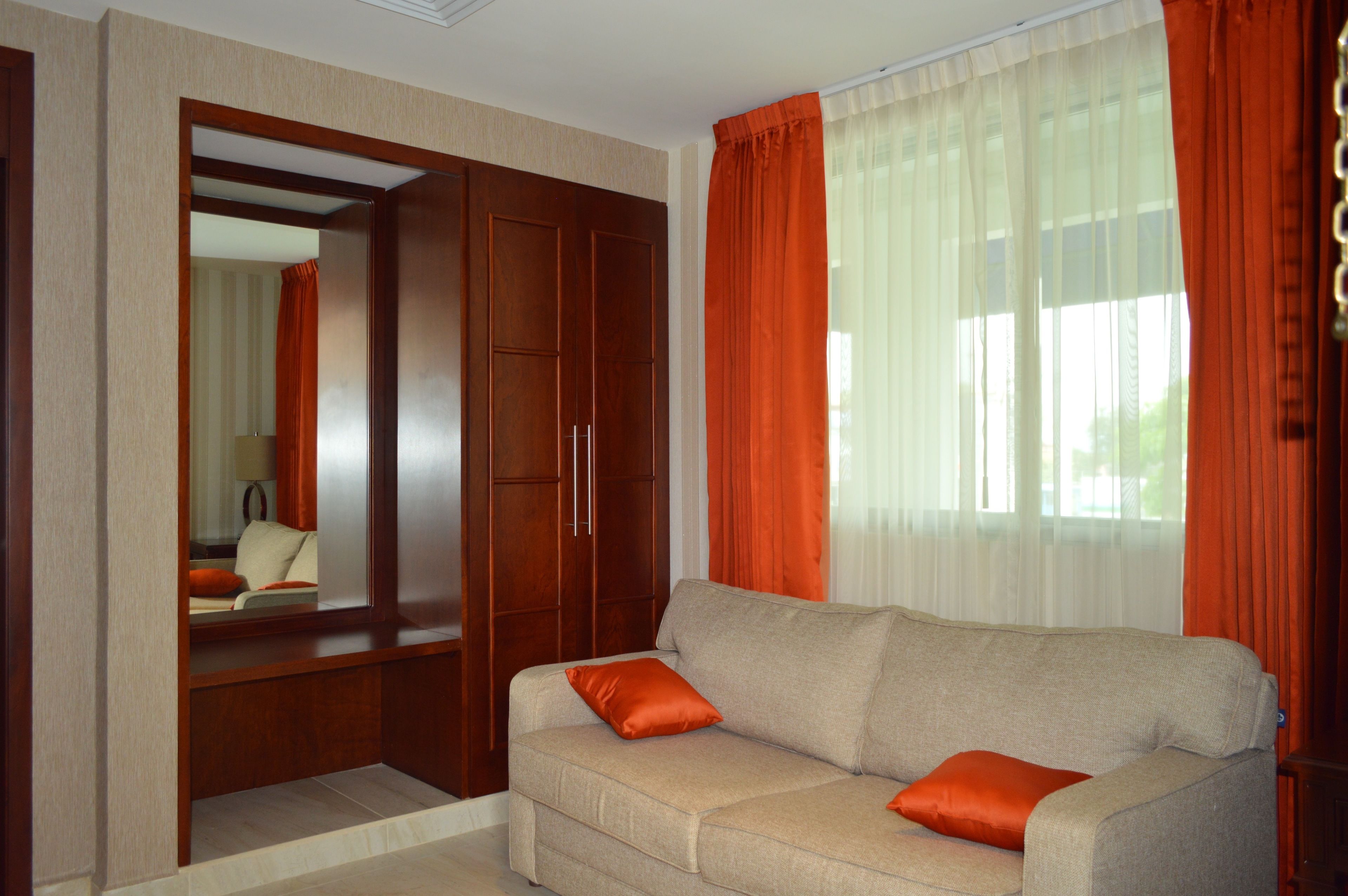 junior suite, 1 king bed with sofa bed | living area | 40-inch flat-screen tv with cable channels, tv