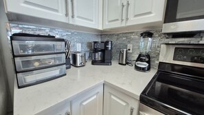 Fridge, microwave, oven, stovetop - Dog friendly beachfront condo with in/out pools (Gulf Shores)