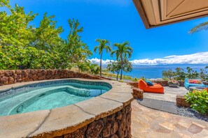 An infinity pool, pool loungers